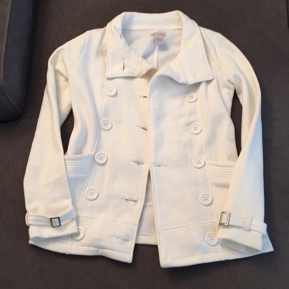 Very soft cream colored pea coat.